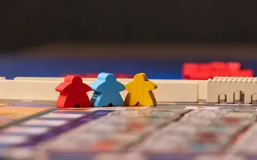 3 toys shape like human being, with 3 different colors